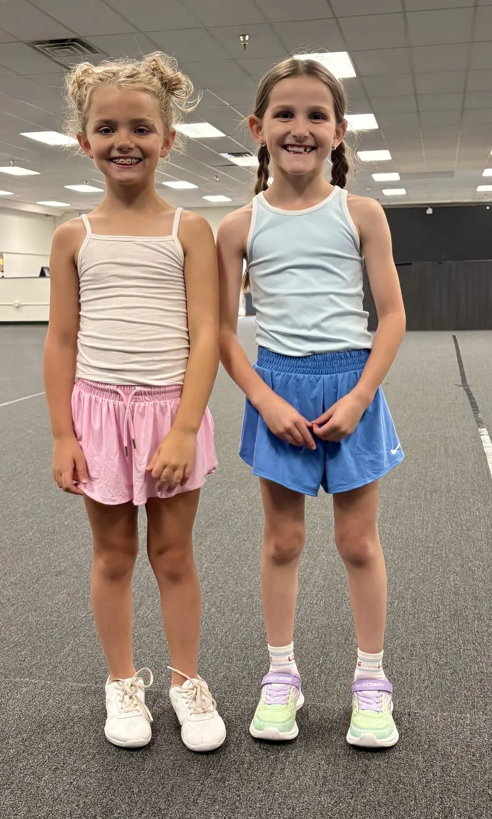 Two smiling young athletes at Velocity Sports Lab